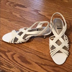 White 2 inch pump sandle. Only worn once.